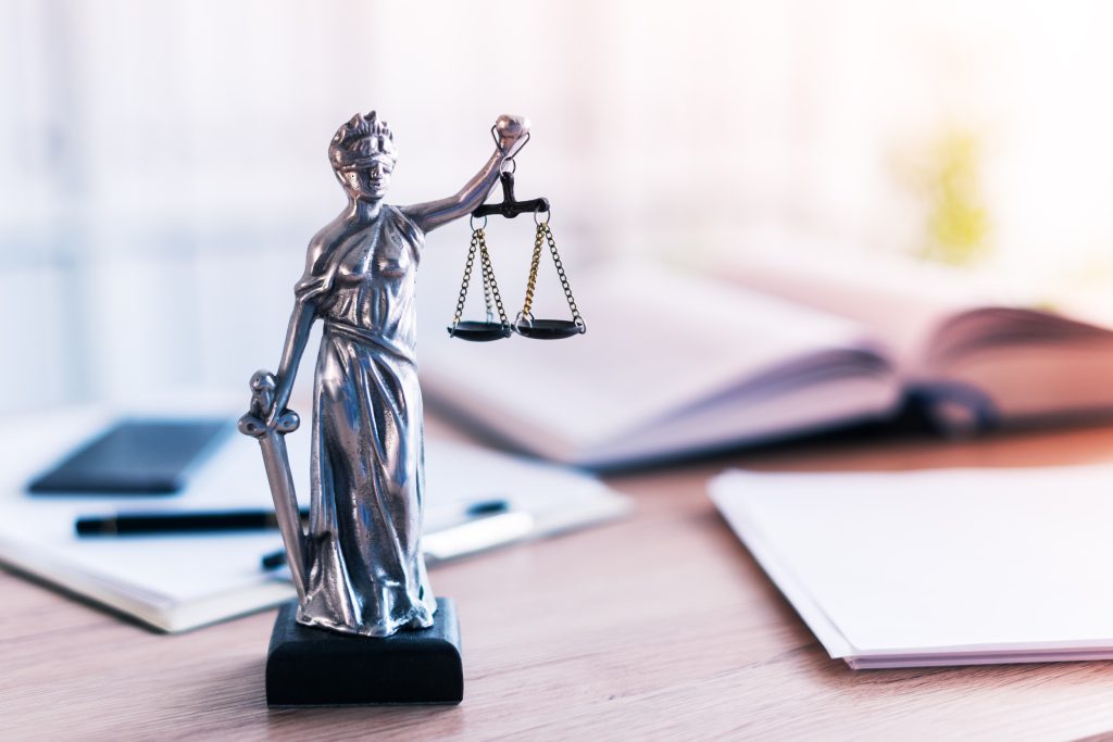 Lady of Justice on a desk